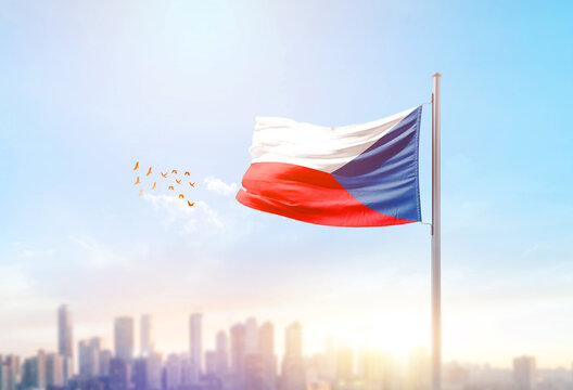 Czech Republic national flag waving with skyline and buildings.