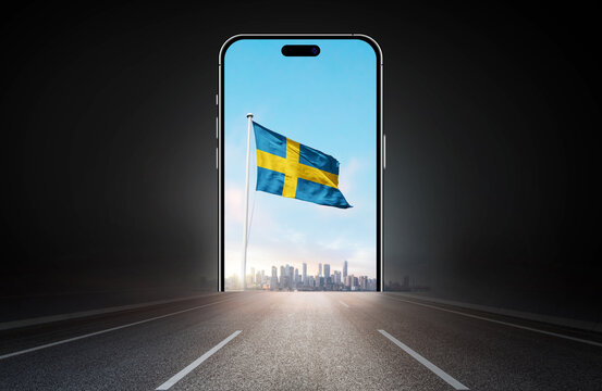 Sweden national flag on phone screen over highway to city. Sweden flag for Republic Day and Independence Day.