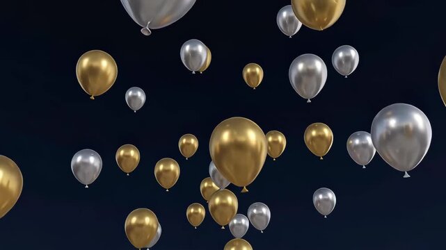 Gold and silver balloons floating in room