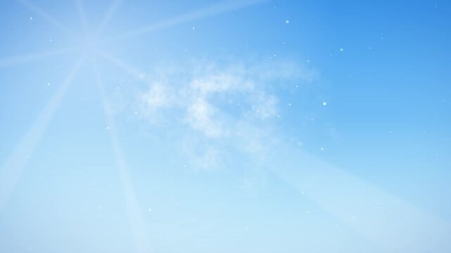 Soft white clouds drift across bright blue sky with radiant sun rays and glowing particles in cinematic motion