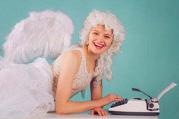 Obraz premium Valentine greeting with a smiling angel. Handwritten Valentine message on cream paper. Valentine card with a romantic cupid. Winged Valentine angel holding a letter.