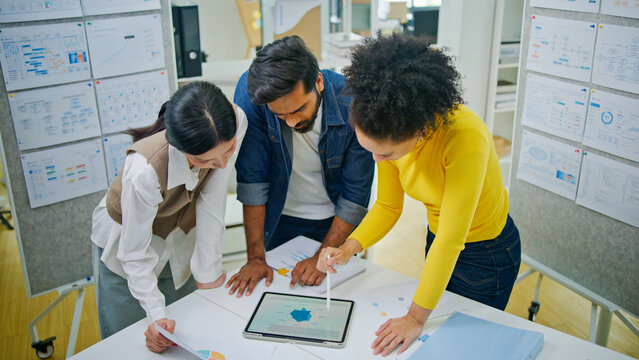 Group of young creative business brain storm meeting presentation,discussing roadmap to product launch, planning,strategy,new business development,working with new startup project in office.