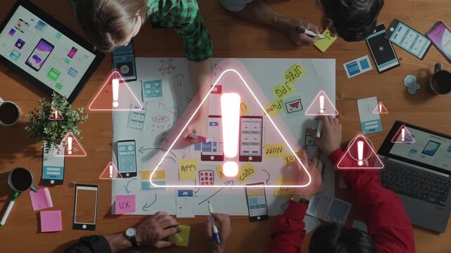 A dynamic collaborative workspace displaying a UX design brainstorming session, featuring sticky notes, wireframes, and multiple digital devices on a wooden table. Raster
