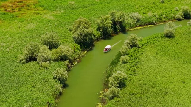 Skadar Lake Montenegro Wetland Channel with Boat