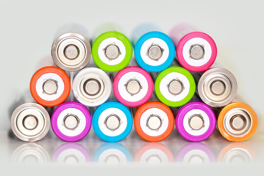 Colorful batteries forming a triangle pattern