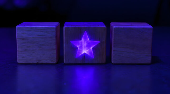 Wooden blocks with a glowing purple star in the center under dark blue light.