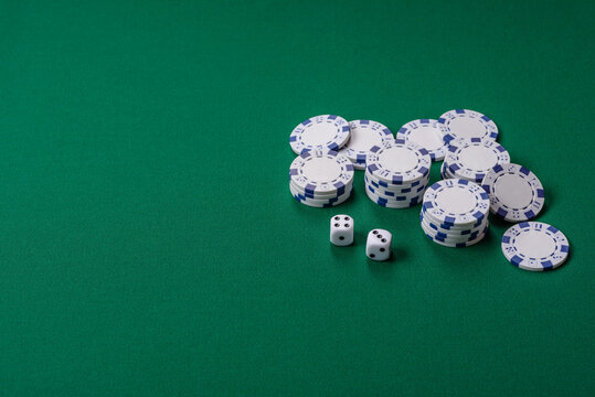 Multicolored casino chips as a conceptual backdrop for gambling games like poker, blackjack