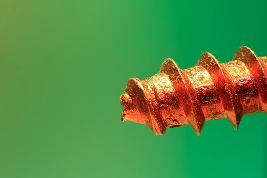 Macro shot of metal screw showing thread detail ,focus stacked image.