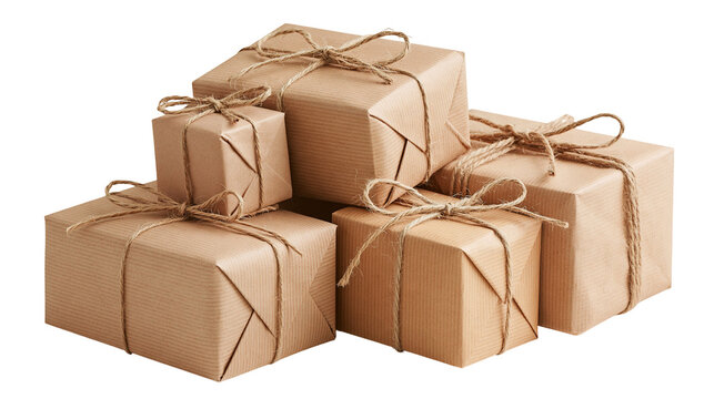 Stacked rectangular gift boxes wrapped in brown craft paper with rustic twine bows