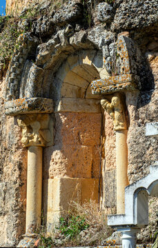 Romanesque splayed apse window with carved capitals and slit, rubble masonry, 12th-century church of Nuestra Senora de la Natividad, Calahorra de Boedo, Palencia, Castile and Leon, Spain