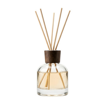 Glass reed diffuser with wooden sticks and golden oil on transparent background
