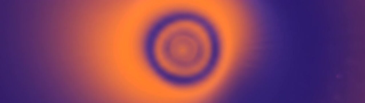 Motion background with swirling orange and purple gradients hypnotic vortex effect for modern digital design and creative visual storytelling.