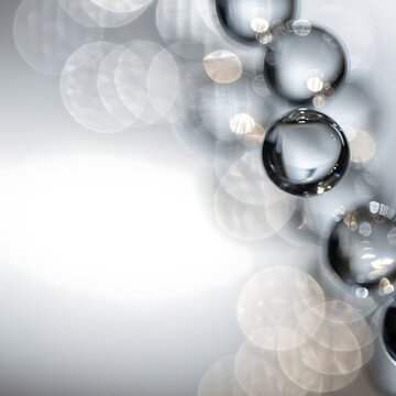 Abstract close up of clear glass orbs arranged in a diagonal pattern