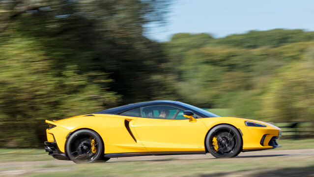 Milton Keynes; UK - Sept. 26th 2026: 2025 yellow McLaren gts v8 s-a supercar car driving on a British road