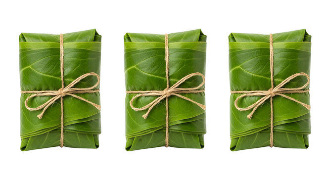 Three Traditional Food Parcels Wrapped in Fresh Green Banana Leaves Isolated on a Clean Transparent Background for Culinary Designs