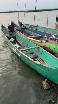 Traditional Wooden Fishing Boats on Water