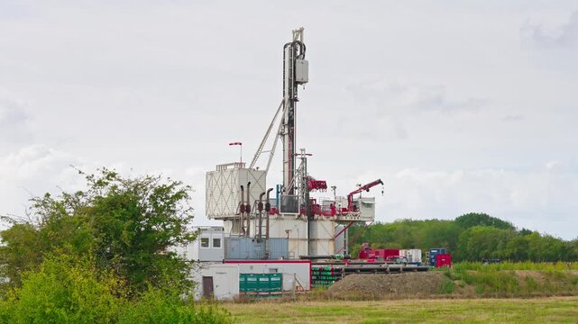 Static view of a deep drilling rig near R&oslash;dbyhavn, Denmark, during exploration well operations for onshore geological CO2 storage, CCS site characterization and subsurface investigation.