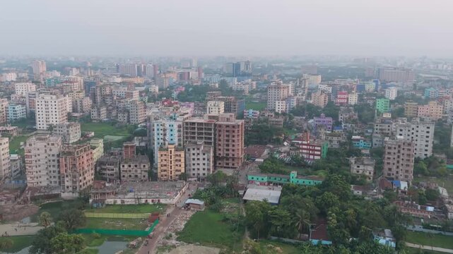 Cityscape expands across a densely populated urban area with buildings and greenery residential