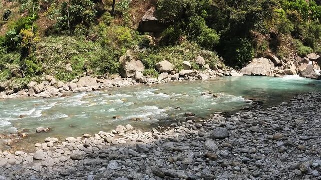 Scenery view of Langtang Khola river a river coming from the south flows down along the Langtang trekking route, Nepal. 