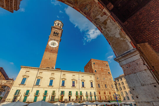 historic Torre dei Lamberti rising above Piazza delle Erbe in Verona