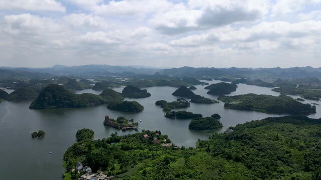 Aerial View of Green Islands and Resort Buildings in a Scenic Lake in Thousand Island Lake, China