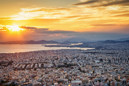 Panoramic view of the urban Athens skyline during a beautiful sunset, Attica, Greece