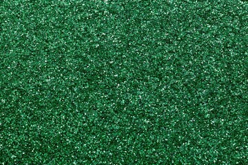 Fototapeta premium The Green Glitter Texture Closeup of Sparkling Surface for Festive Decor