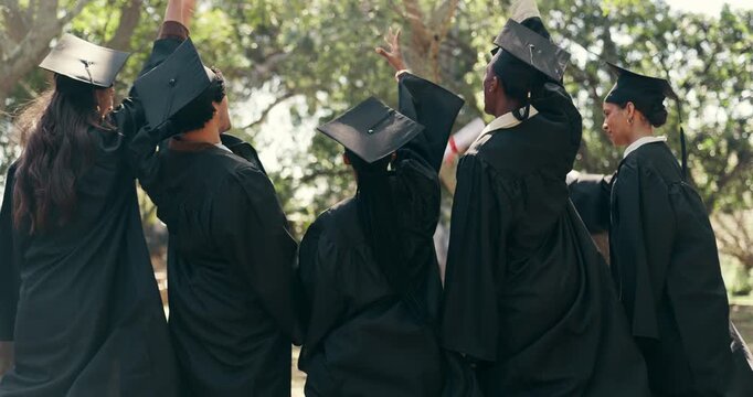 Excited, students and diploma at campus for graduation, farewell or celebrate of degree completion. People, tossing and graduate outdoor with regalia, university achievement and educational milestone