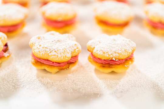 Lemon Spritz Cookie Sandwich with Cranberry Buttercream