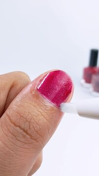 Nail care treatment on thumbnail, close up of healthy manicure routine for strong and beautiful nails concept