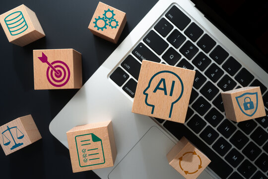 AI agents autonomously planning tasks and using data to achieve defined goals. Compliance and security for responsible AI use in business. Wooden cubes on laptop computer.
