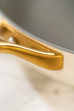Closeup of Gold Handle on Saucepan