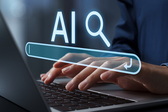 AI for information search and research. Businessperson entering prompts into AI system on laptop to discover knowledge.