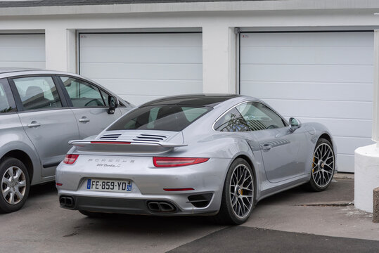 Nancy, France - July 13th 2019 : View on a grey Porsche 991 Turbo S MkI parked on a street.