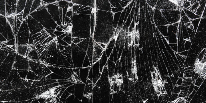 cracked broken black glass texture and background