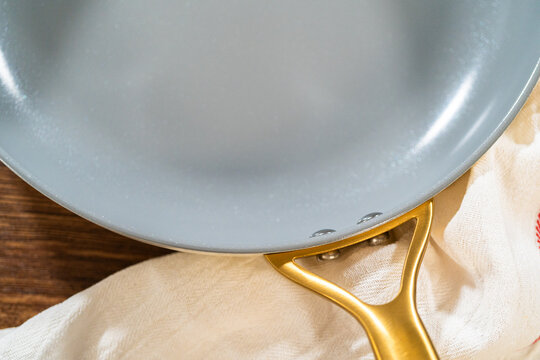 Gray Nonstick Pan with Gold Handle Detail