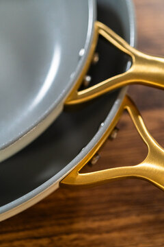 Golden Handles on Ceramic Kitchen Cookware
