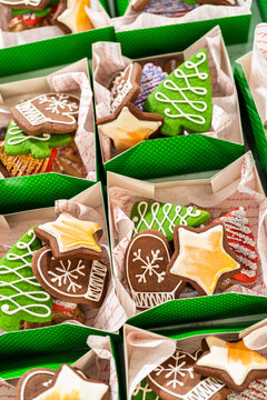 Festive Green Holiday Cookie Gift Boxes with Decorated Treats