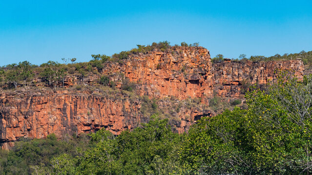australia kimberley dramatic landscape sandstone red orange cliffs iconic scenery water ocean coastal