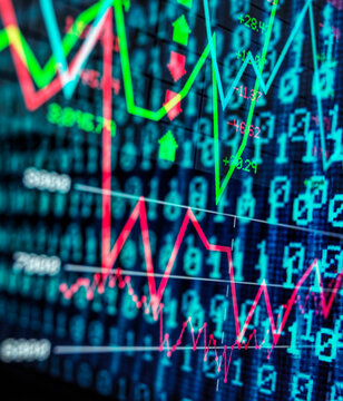 Digital screen displays financial stock market data and binary code