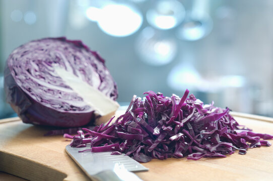 Red cabbage on wooden board