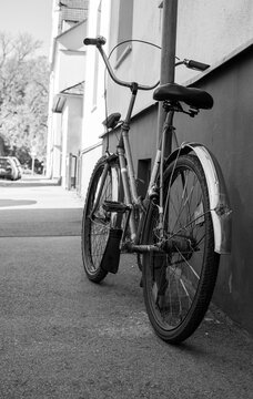 Old Vintage Bicycle Parked on a Street in Retro Style