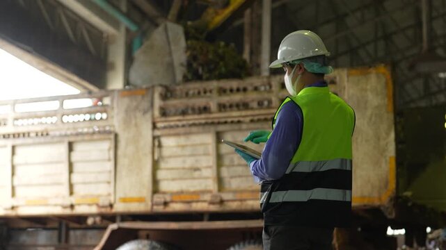 engineers inspect municipal waste for renewable energy.