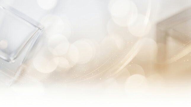 Abstract minimalist white and gold background with blurred bokeh and shimmering light dust