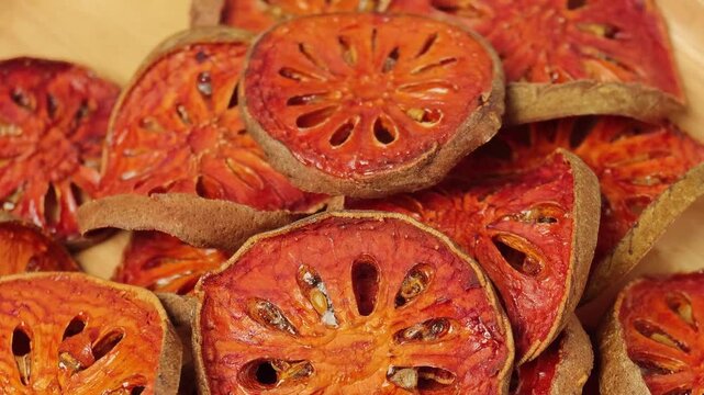 many of slices of bael fruit for make bael juice.