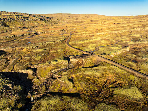 Aerial view of the scenery over a mountain range - Iceland