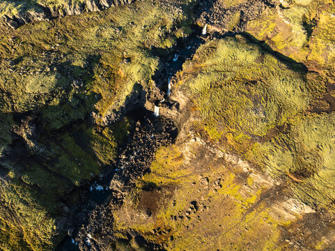 Aerial view of the scenery over a mountain range - Iceland