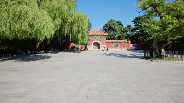 Stone courtyard and red gateway at Zhaoling Tomb in Shenyang, China