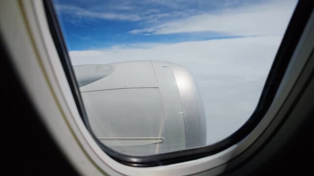 Aerial view of cloudscape from passenger airplane window