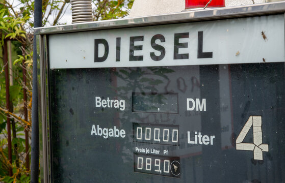 Old Retro Vintage Fuel Pump Showing Low Diesel and Gasoline Prices &ndash; Symbolic Fuel Cost and Energy Concep
